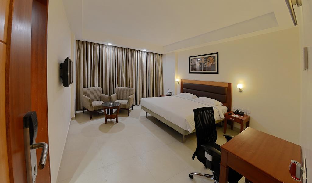 Poppys Anukula Residency Vellore Room photo