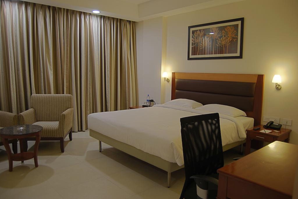 Poppys Anukula Residency Vellore Room photo