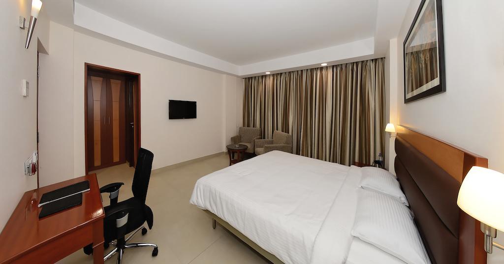 Poppys Anukula Residency Vellore Room photo